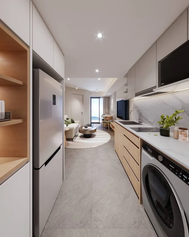 Kitchen with washing machine in a Vibe Downtown Karon one-bedroom