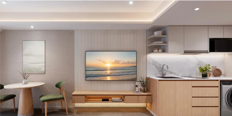 Living room and kitchen of a 35 m² one-bedroom at Vibe Downtown Karon